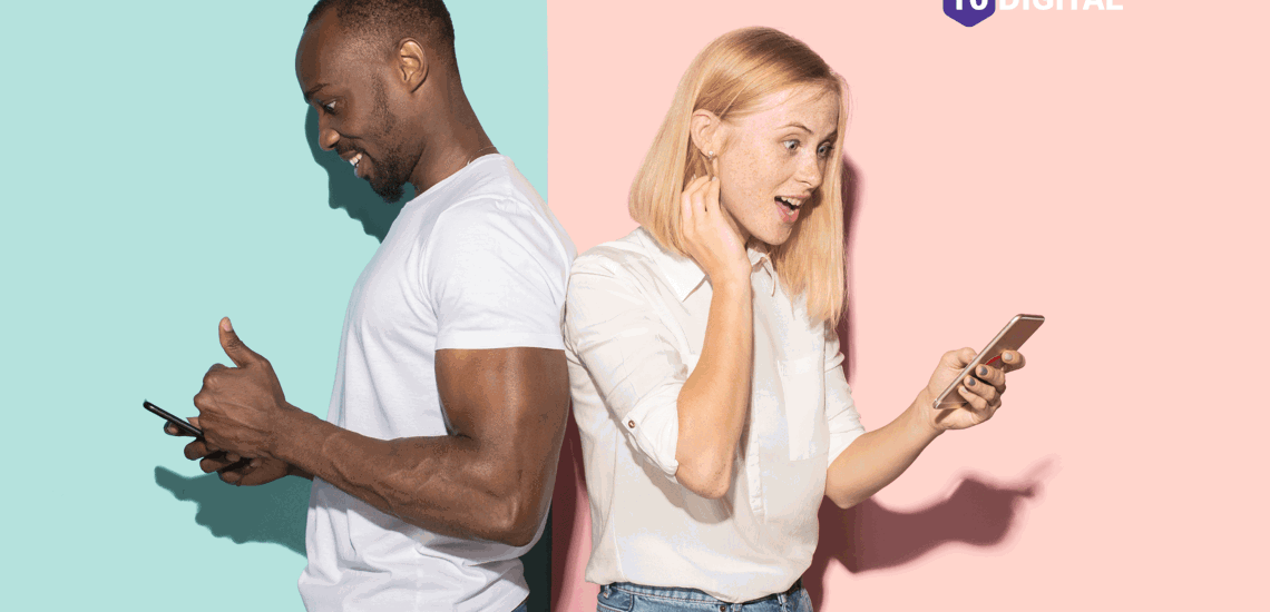 man and woman on their phones smiling
