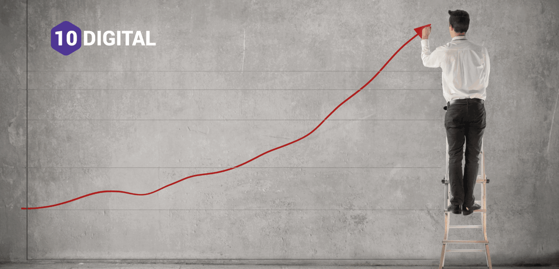man on a chair drawing increase line graph
